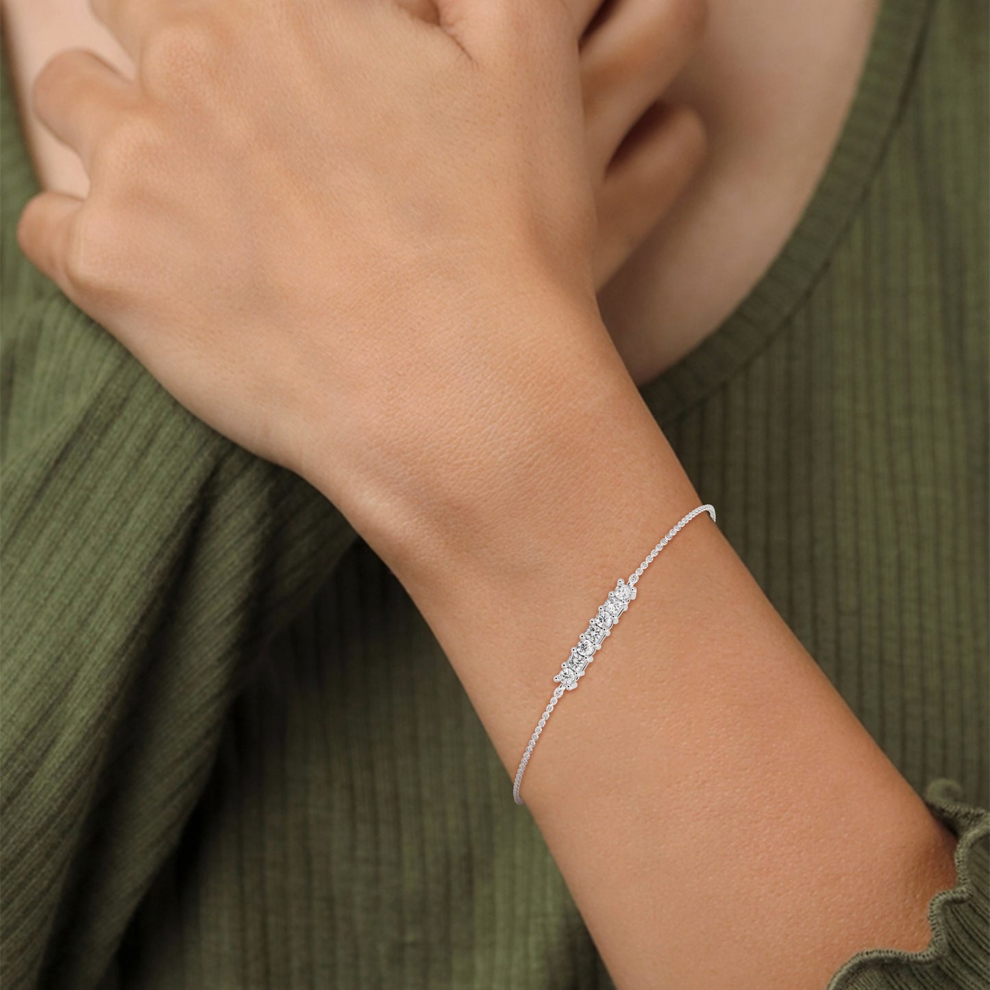 sterling silver diamond round bracelet on women hand