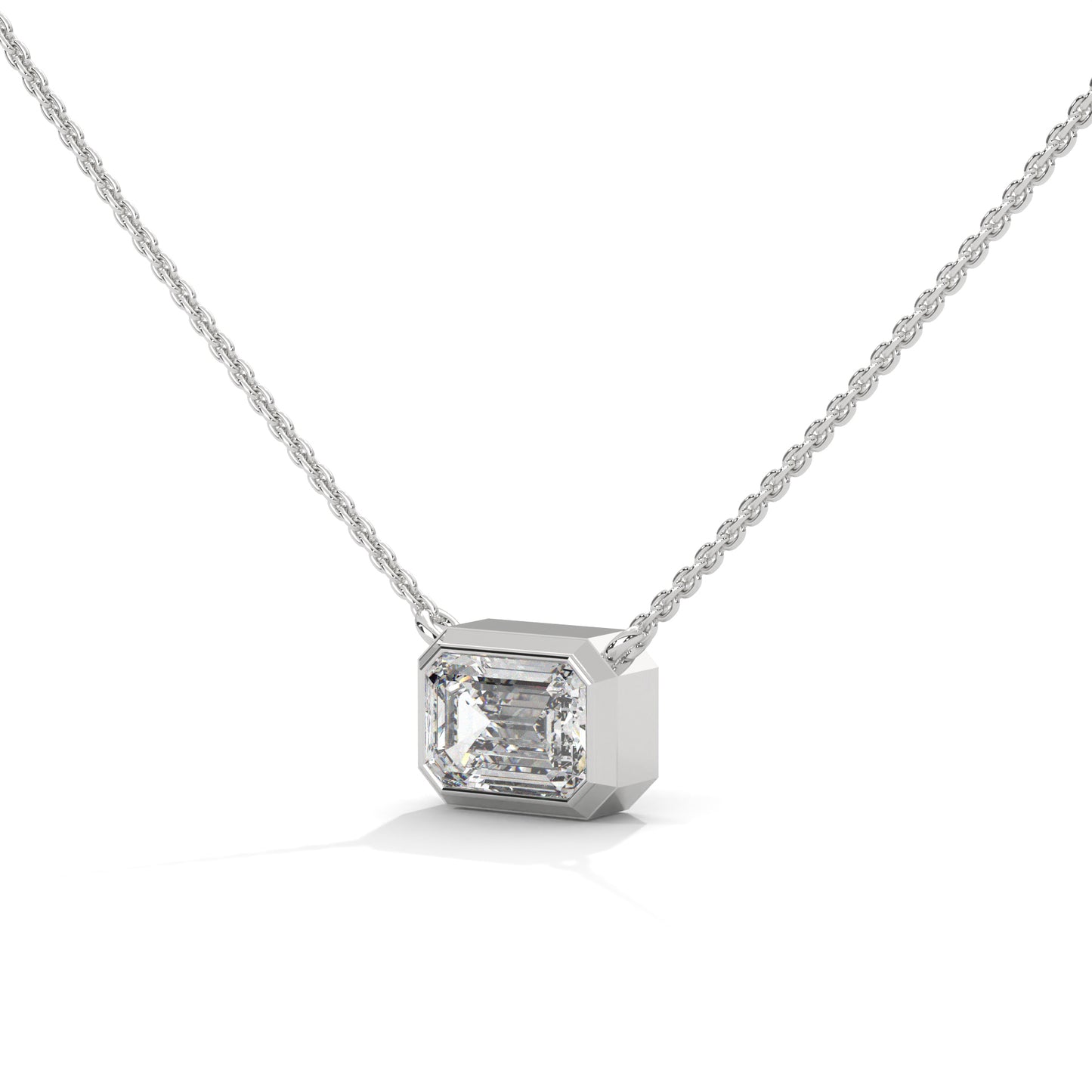 silver diamond pendent in emerald shape