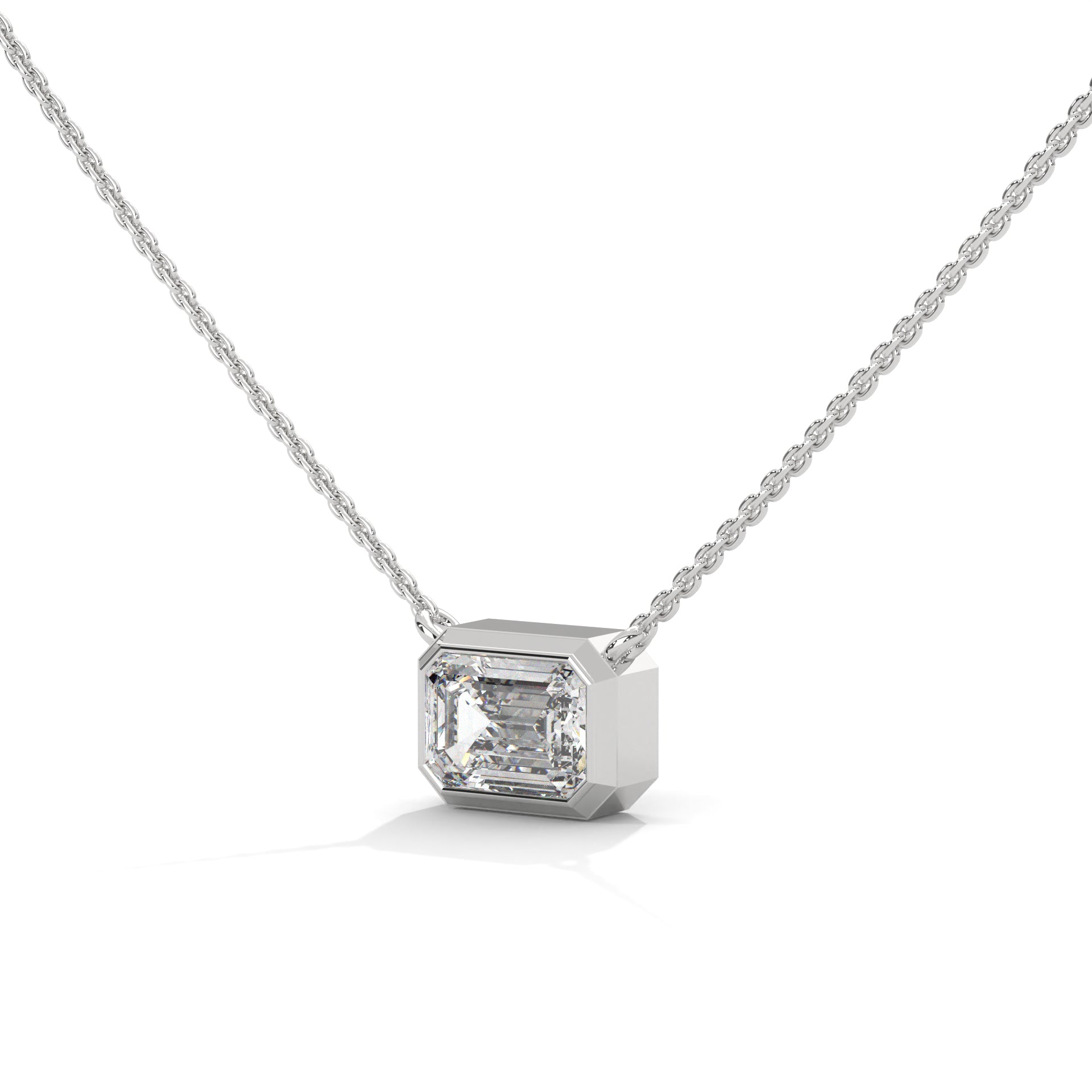 silver diamond pendent in emerald shape 