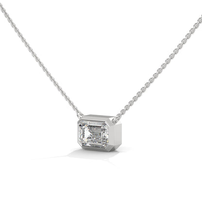 silver diamond pendent in emerald shape 