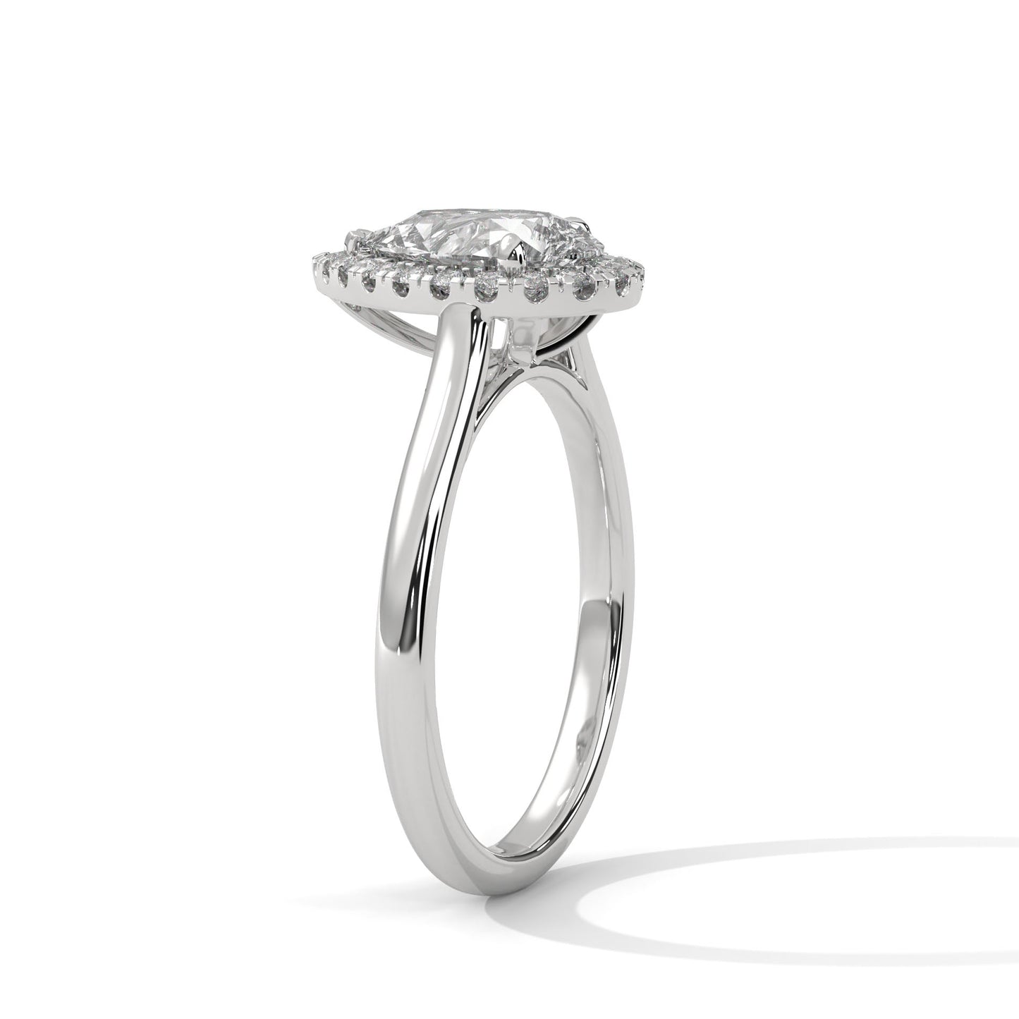 DAZZELING PEAR HALO RING