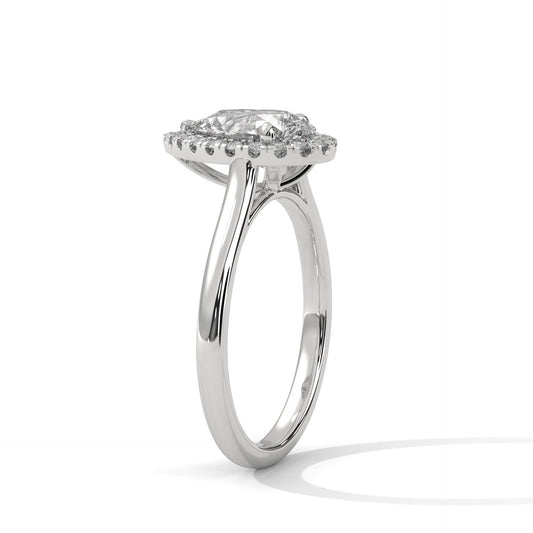 DAZZELING PEAR HALO RING